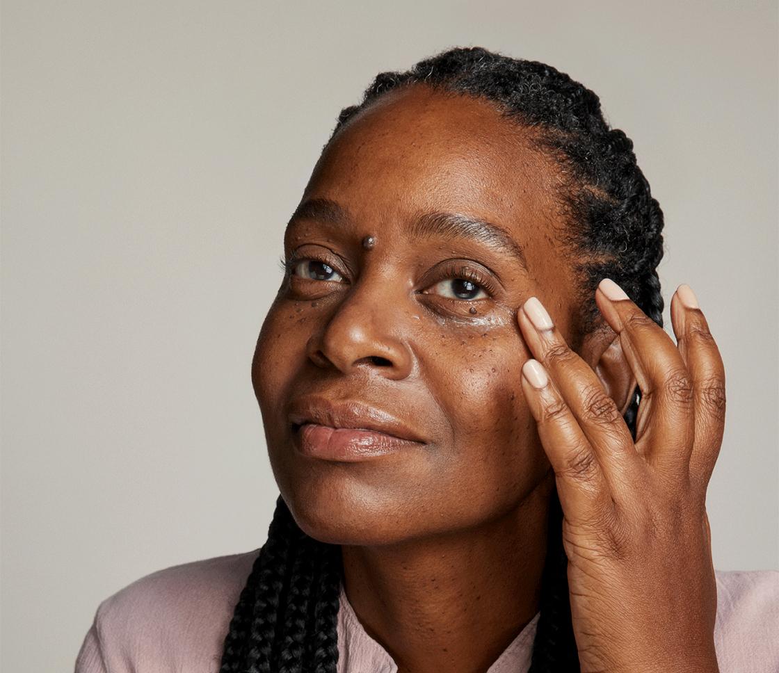 Woman applying Agency Eye Formula