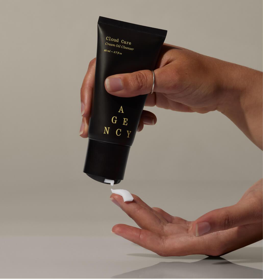 Close up of hands dispensing cleanser product
